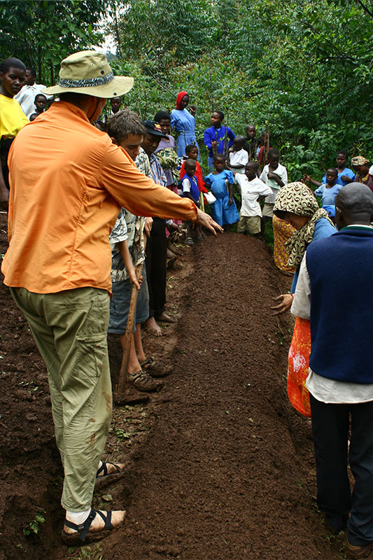 Master gardener Marcia Hafner of Eugene orchestrating the terracing project