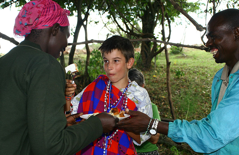 Paul and his Maasai godparents at his 12th birthday in Enoosaen