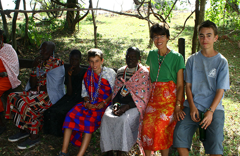 Celebrating with Ole Ronkei's mother at Ole Ronkei's homestead